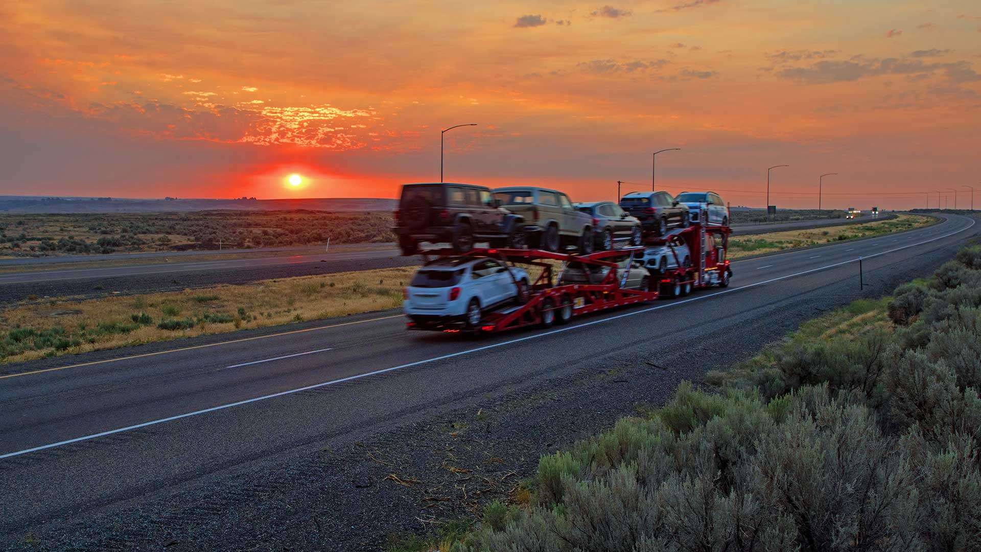 seasonal fluctuations in auto transport photo at sunset