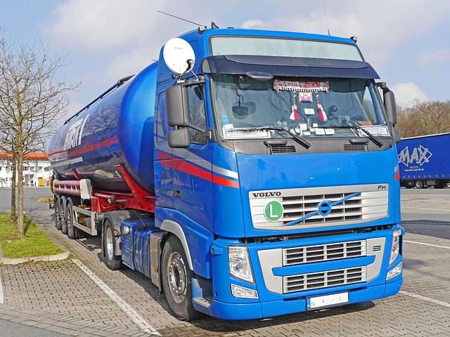 photo of blue tank-truck clean energy semi-truck