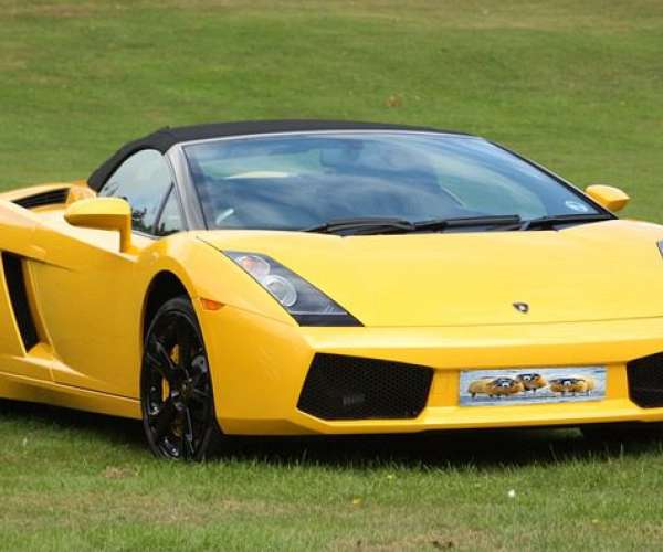 photo of a beautiful yellow sports car shipping