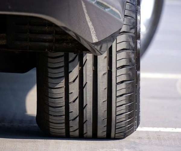photo of car with new tires