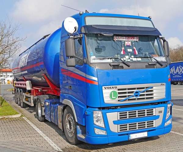 photo of blue tank-truck clean energy semi-truck