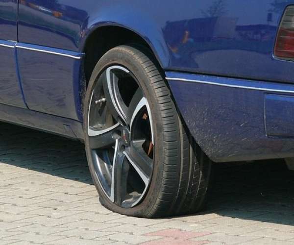 photo of a flat tire blowout