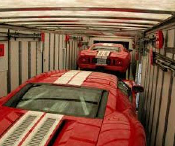 Loading a sports car into an Enclosed Car Transporter