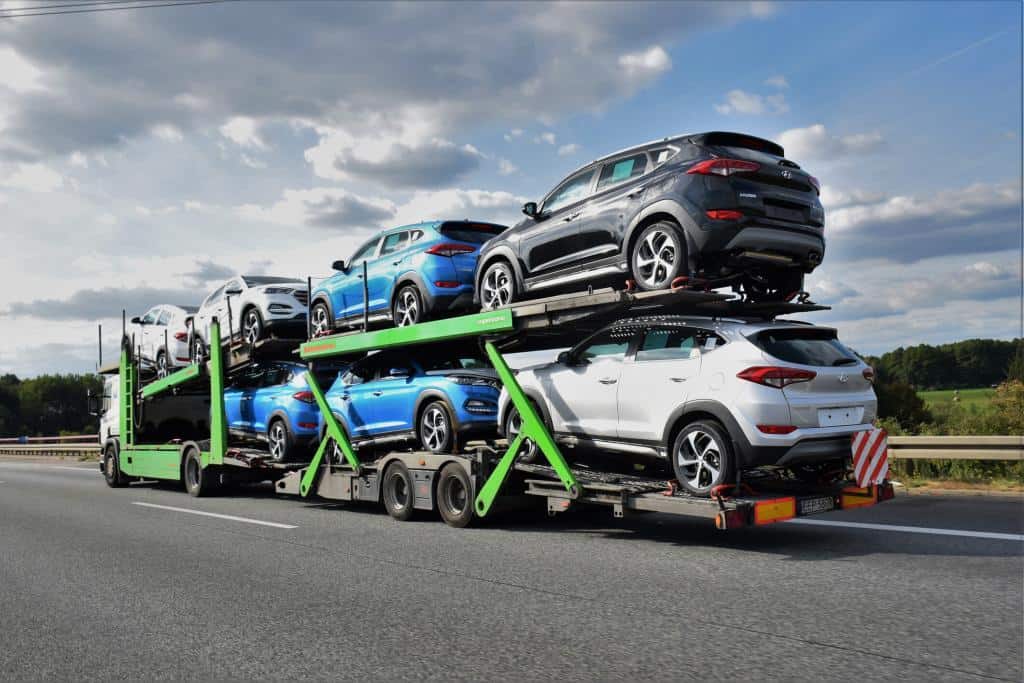 photo of Car transport carrier on highway